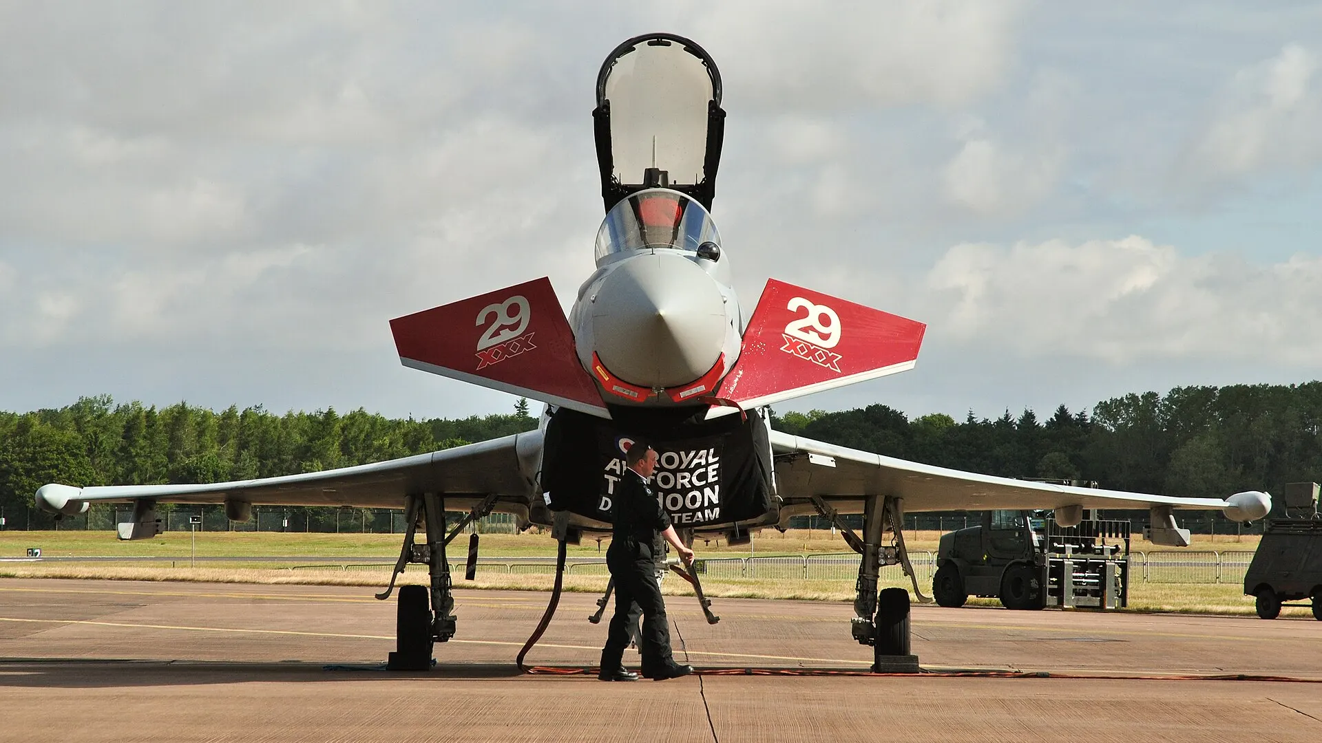 A grey Royal Air Force Typhoon FGR4 fighter jet in flight at the Royal International Air Tattoo in England in 2015