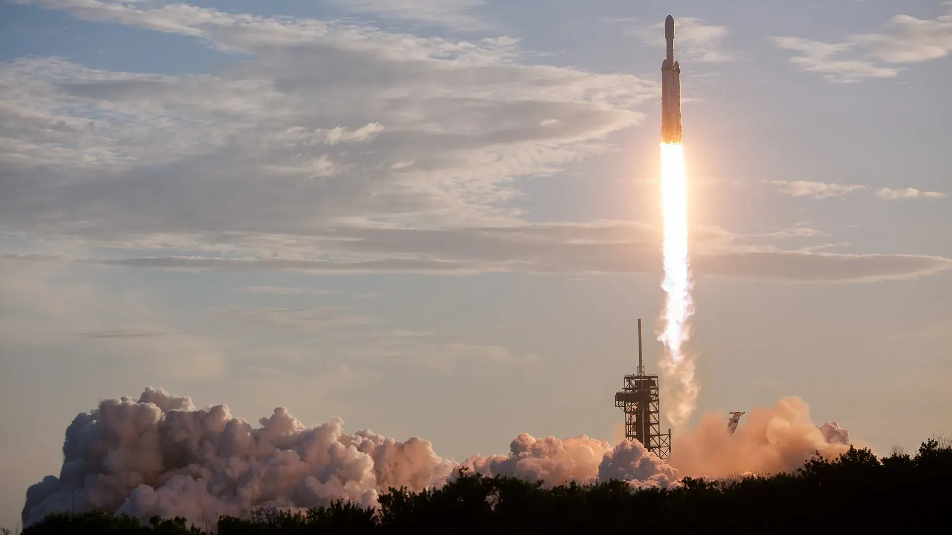 A SpaceX Falcon Heavy rocket lifts off from Launch Complex 39A at Kennedy Space Center in Florida carrying the Nancy Grace Roman Space Telescope