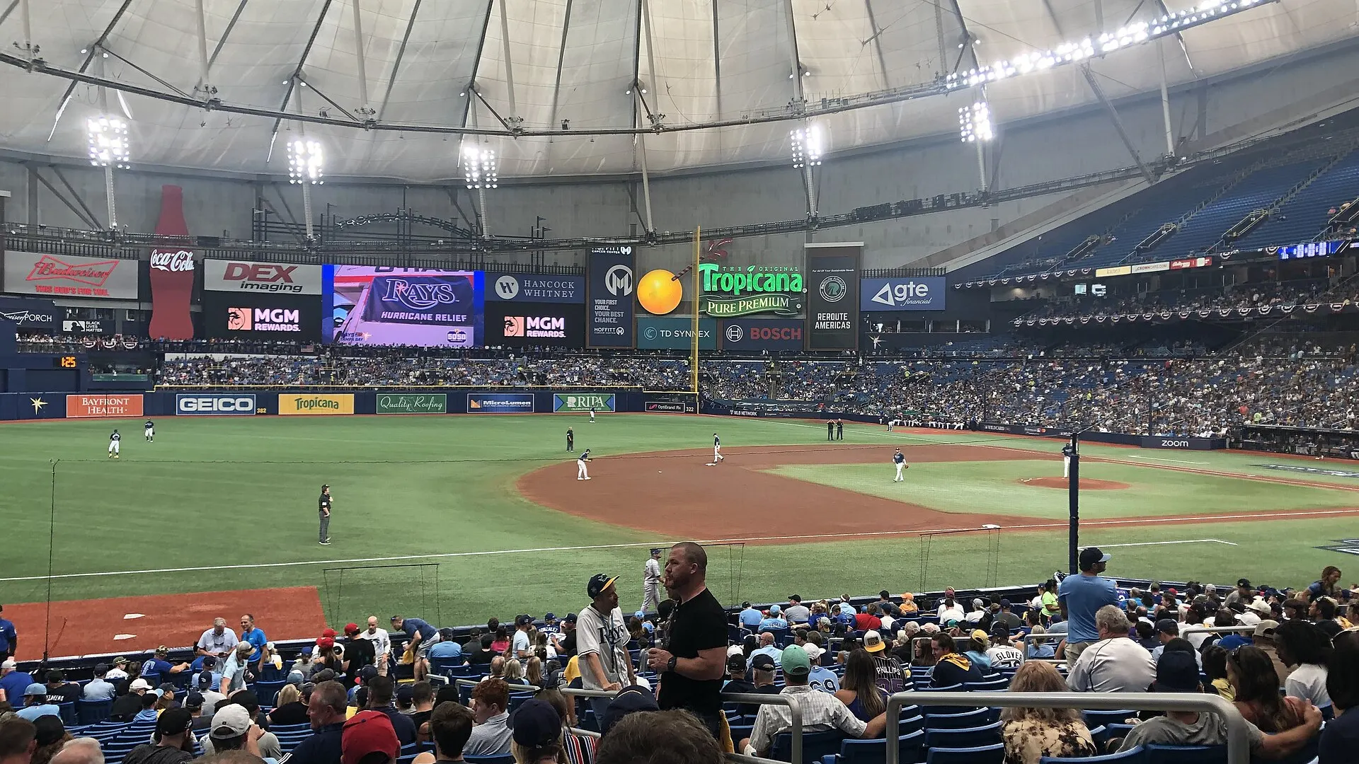 Fans watch from the stands under the domed roof of Tropicana Field in St. Petersburg, Florida, during a 2023 Rays playoff game